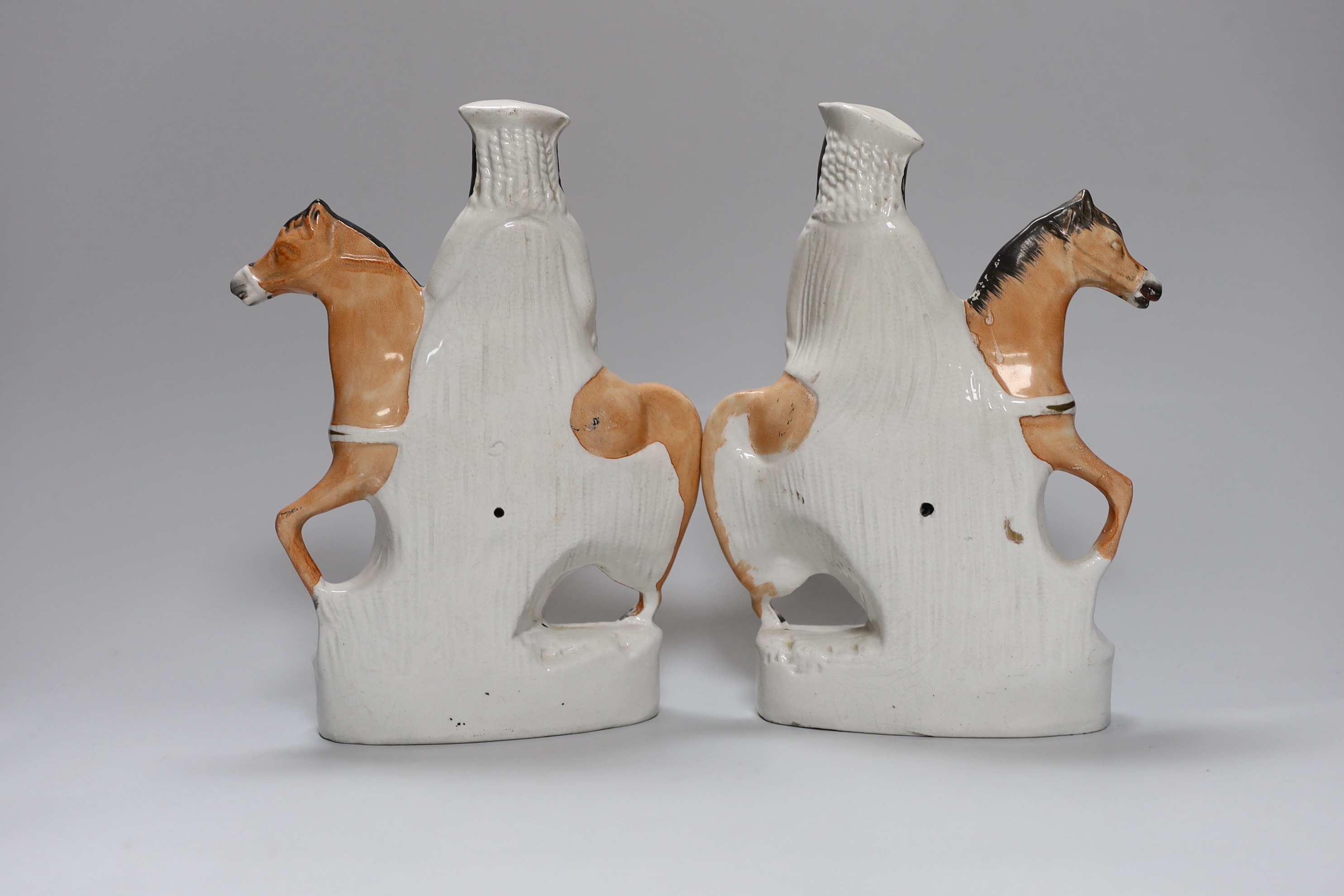 A pair of Victorian Staffordshire pottery flatback equestrian groups of Dick Turpin and Tom King, tallest 24cm high